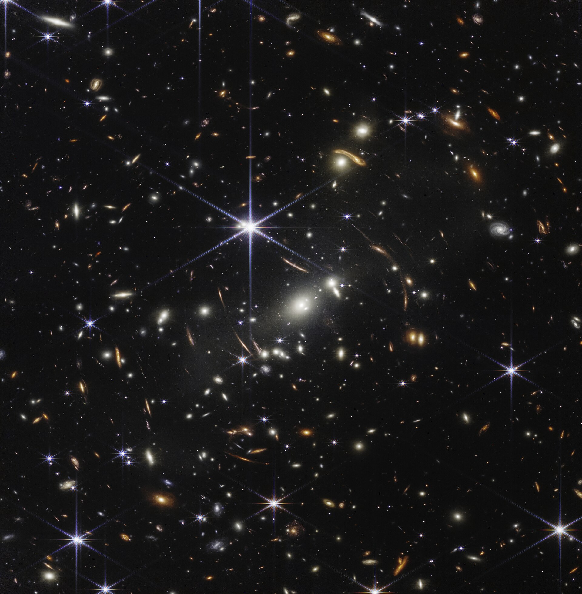 James Webb Space Telescope First Deep Field (SMACS 0723) near-infrared image showing thousands of galaxies, including many faint, small structures and star-cluster-like features.