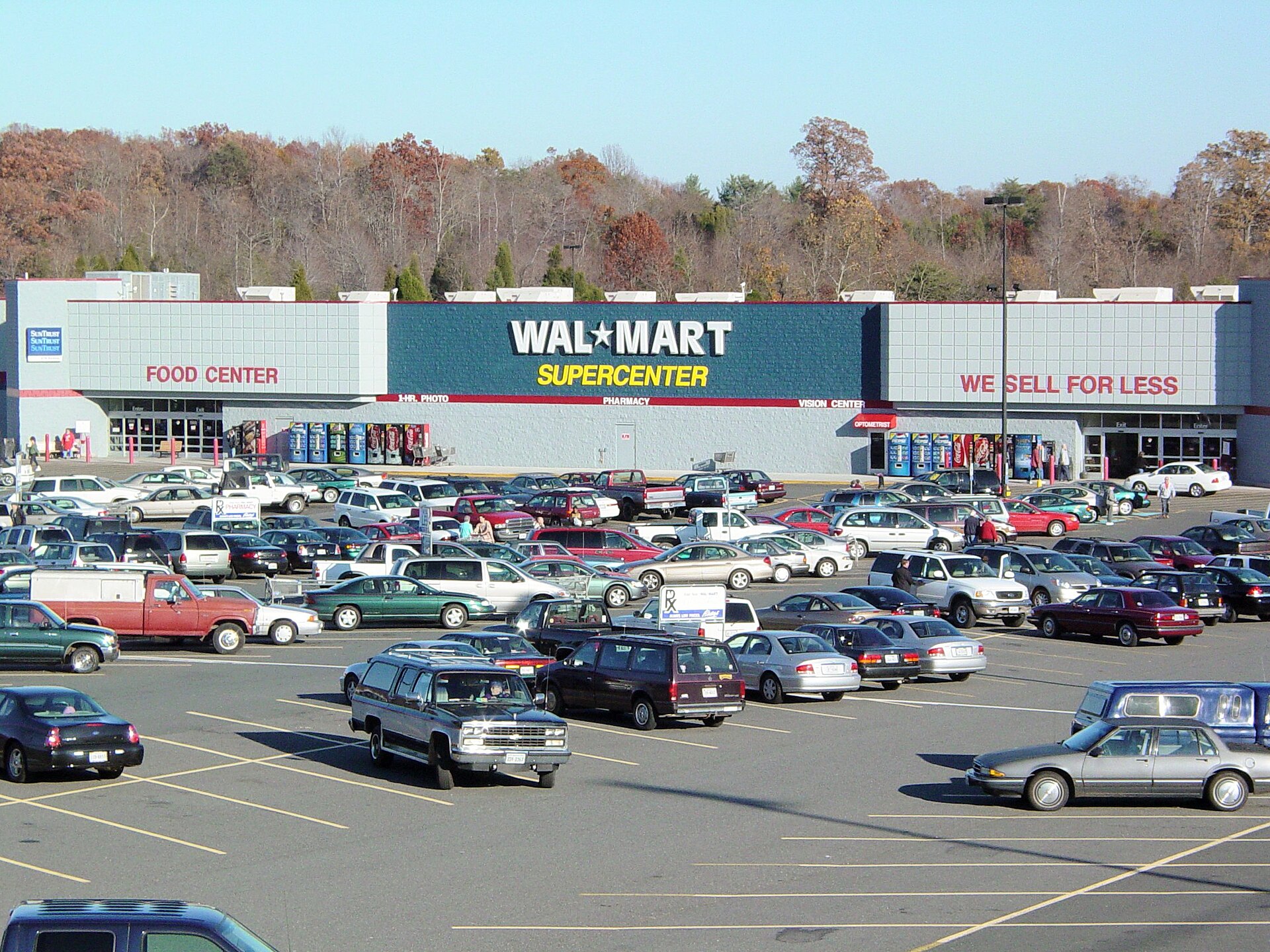 Exterior of a Wal‑Mart Supercenter store building and parking lot.