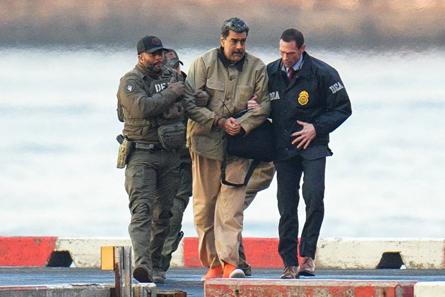Portrait photo of Nicolás Maduro, wide enough for a news banner. Caption: 'Venezuelan leader Nicolás Maduro. U.S. news outlets report a June 2027 trial date in a U.S. drug‑trafficking case.'